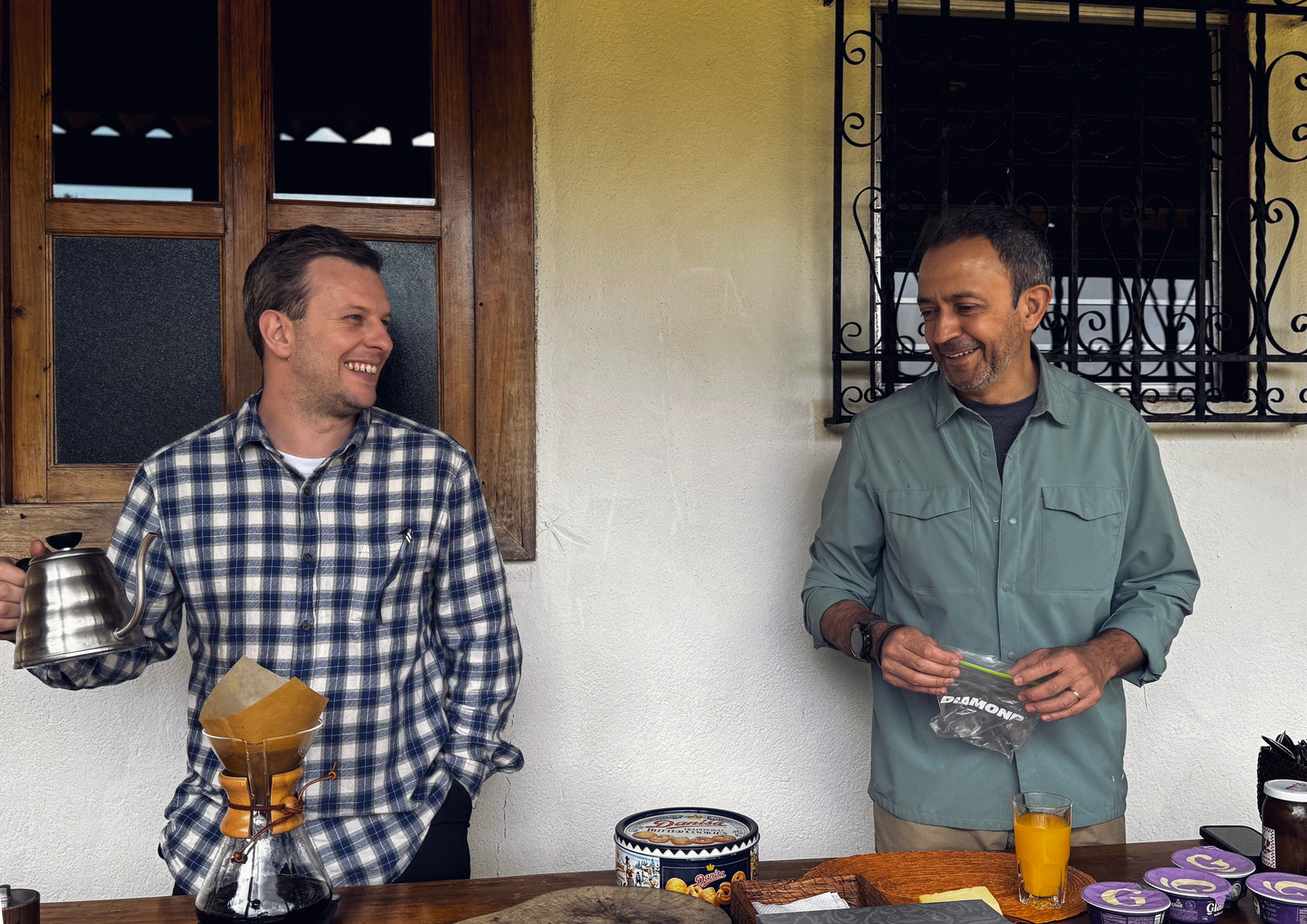 Jared and Nando brewing coffee at Finca Santa Ana.