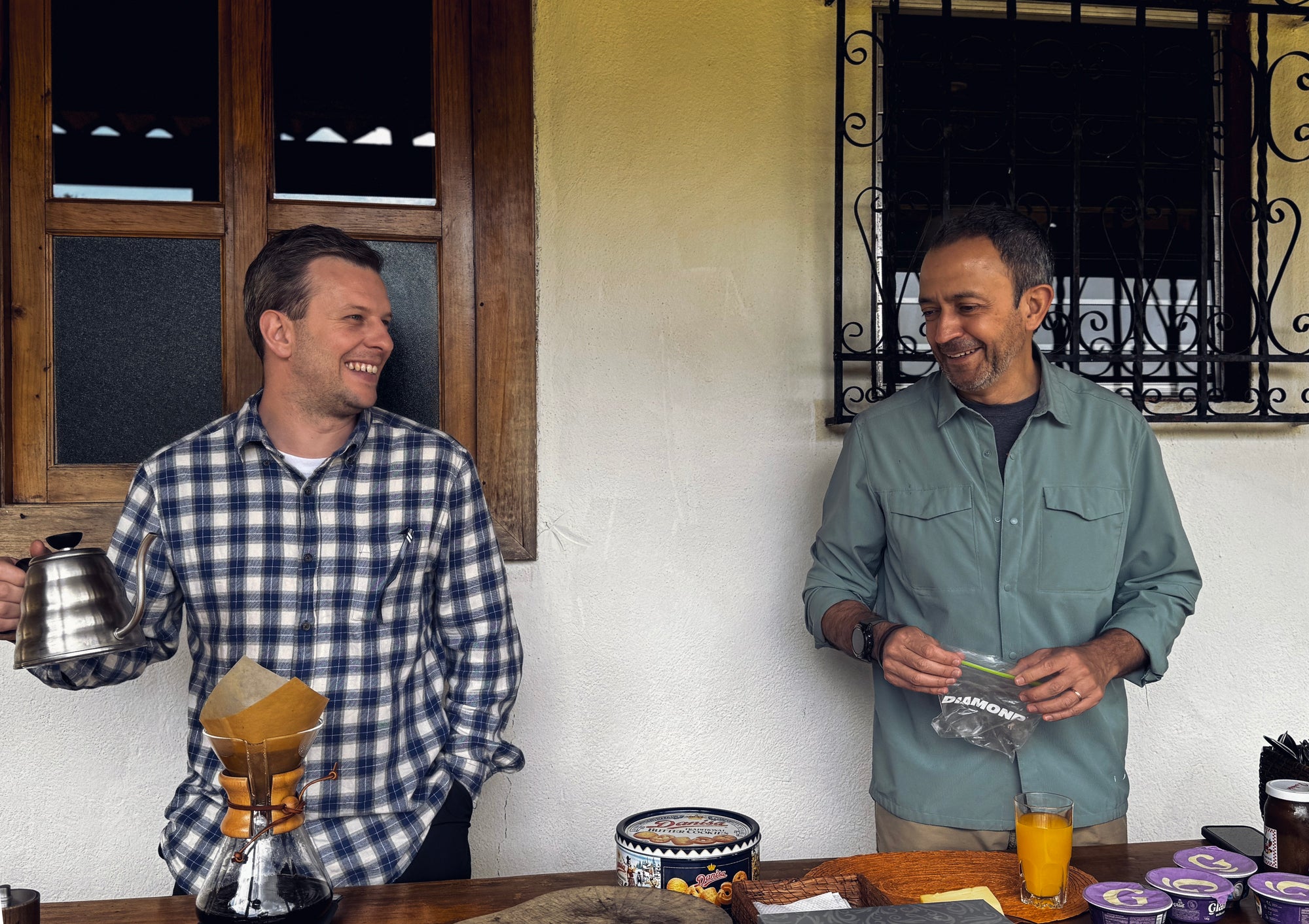 Jared and Nando brewing coffee at Finca Santa Ana.
